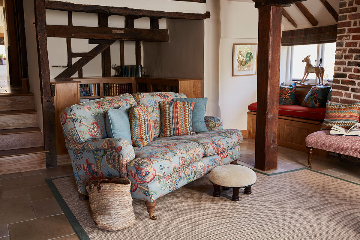 Sofa in Popinjay, zig zag cushions in Vibe, footstool in Fret, all by Ian Sanderson